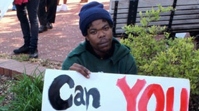A St. Louis worker protests the minimum wage.