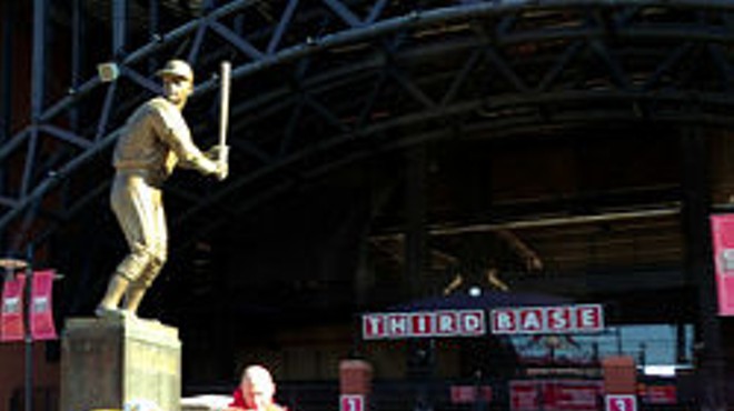 The Musial statue outside Busch Stadium has become a place of pilgrimage for the Cardinals faithful.
