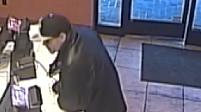 Surveillance footage shows a bad guy with a BB gun holding up the Taco Bell near Dogtown.