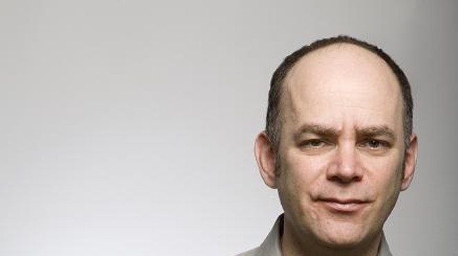 Todd Barry looking "playfully fed-up."