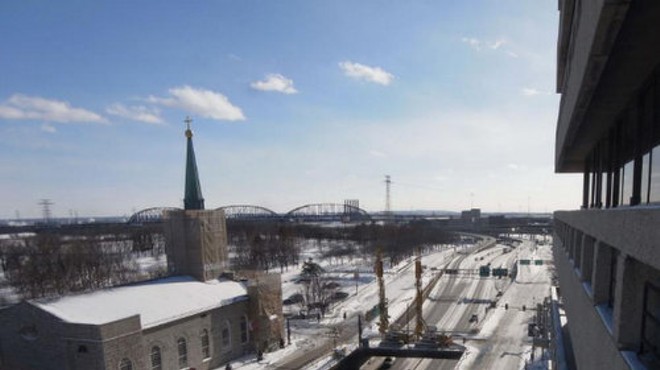 The webcam's view of Walnut Bridge, live midday Monday.