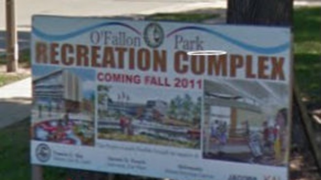 Signs in the park still promise the opening of the center in 2011.