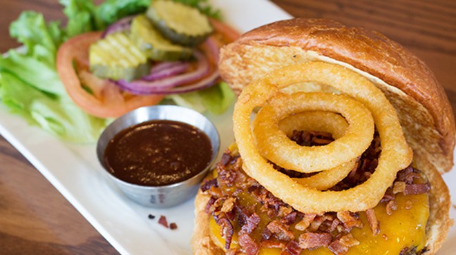 Five Star Burgers' "Gateway Burger" with smoked bacon, cheddar, onion rings and Uncle Jack's barbecue sauce.