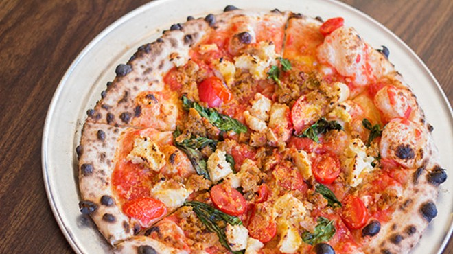 Pizzeoli's "Baba" with fresh tomato sauce, house cashew ricotta, fresh basil, garlic, vegan Parmesan, extra virgin olive oil and vegan ground beef. | Photos by Mabel Suen