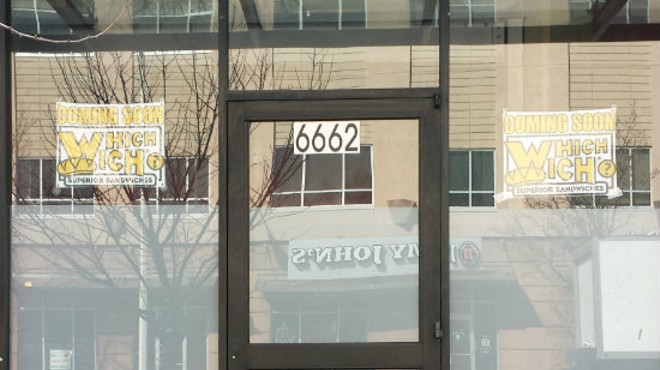Why, yes, that IS a Jimmy John's sign reflected in the Which Wich's new storefront windows. | Jessica Lussenhop