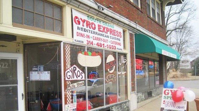 Colorful new graphics adorn the front window of the reopened South Grand Gyro Express.