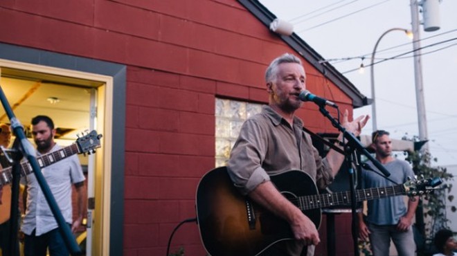 Billy Bragg addresses a crowd of about 100 people on the Royale's patio. See more photos here.