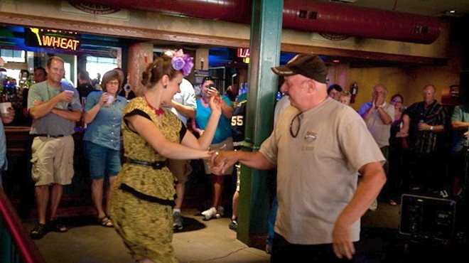 Miss Jubilee and a fan dance during the Big Muddy Blues Festival in 2012.