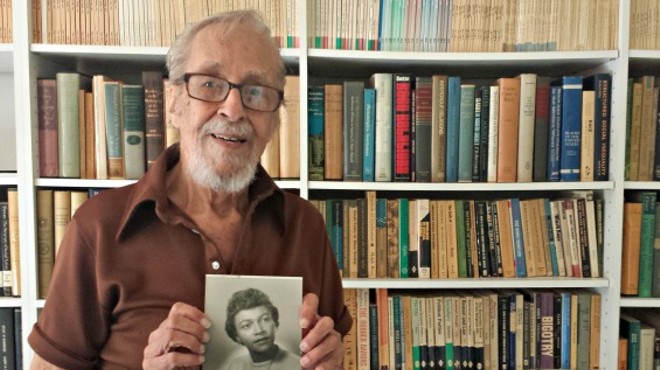 Harry Bash with a photo of his late wife, Carrie.