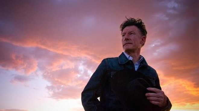 Lyle Lovett, with a sunset.