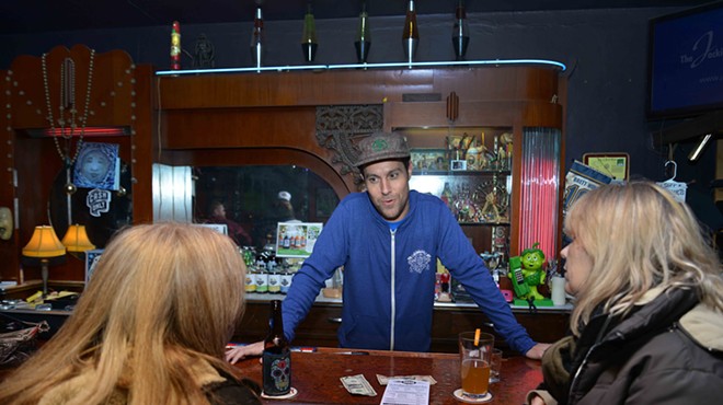 Joshua Grigaitis, aka Joshua Loyal, works the Pop's Blue Moon bar.