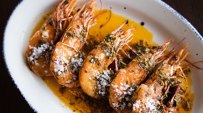 ”Prawns a la Plancha” are served head-on and dressed with garlic, smoked paprika and lemon.