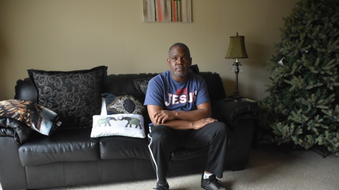 Steve Miller sits in an empty apartment after his wife was detained by ICE.