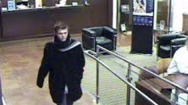 Police identified this stylish bank robber as Mitchell Montgomery.