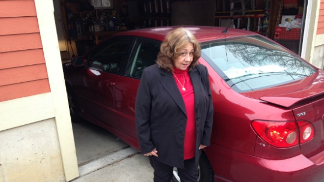 Mary Samuelson told a scammer to scram, but not before he punched two holes in her car.