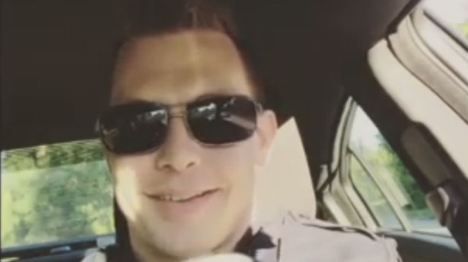Ex-officer Mike Weston plays with his handcuffs in one of his Instagram posts.