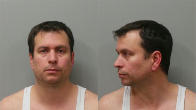 Bryan Vonderahe, shown following a 2016 DWI arrest, gambled and vacation with embezzled cash, authorities say.