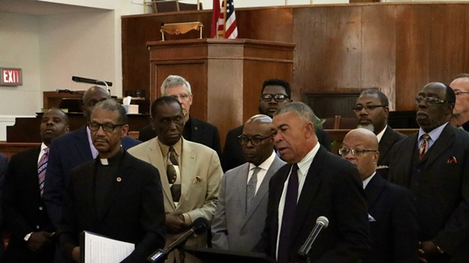 Congressman Lacy Clay, center, joined faith and political leaders in calling on the governor to address gun violence in St. Louis.