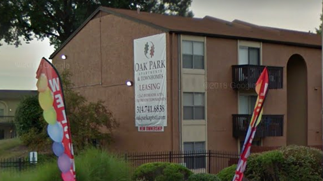 A thirteen-year-old was walking by Oak Park Apartments when he was shot, police say.