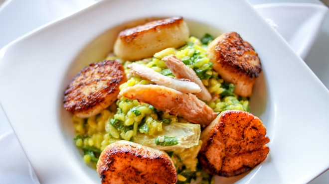 Sea scallops with risotto, crab meat, spinach, artichokes and brown butter sauce