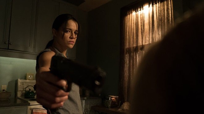 Michelle Rodriguez is hitman turned hitwoman.