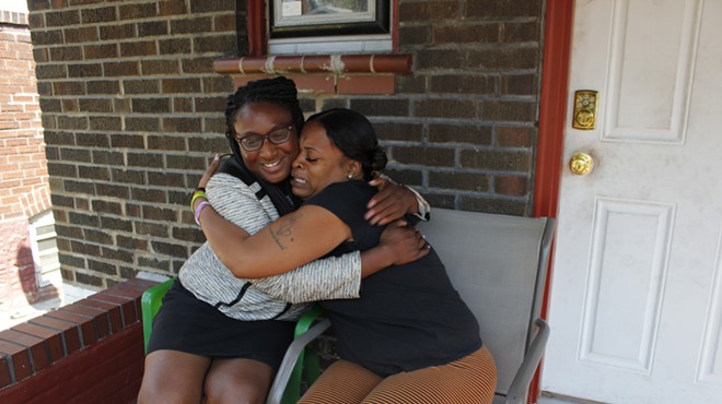 Rhonda Tunstall, right, hugs attorney Kalila Jackson, who helped her through what she says was a frightening ordeal.