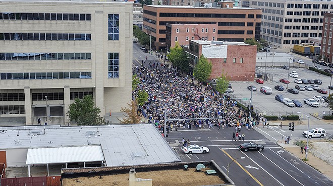 Hundreds of people massed outside the St. Louis Metropolitan Police headquarters on the afternoon of Sunday, September 17.