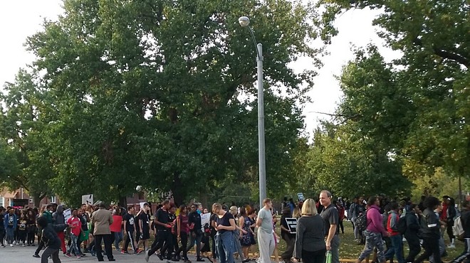 Students protest in front of University City High School.