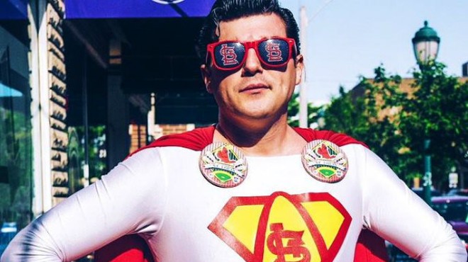 Charlee Soffer, also known as St. Louis Superman, poses in his newest white suit. He only wears the white Superman suit for special occasions, the playoffs and Cardinals vs. Cubs games.