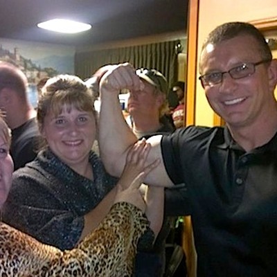 Diane Emery and Robin Beard Gordon of Caseyville Cafe check out Robert Irvine's muscles.