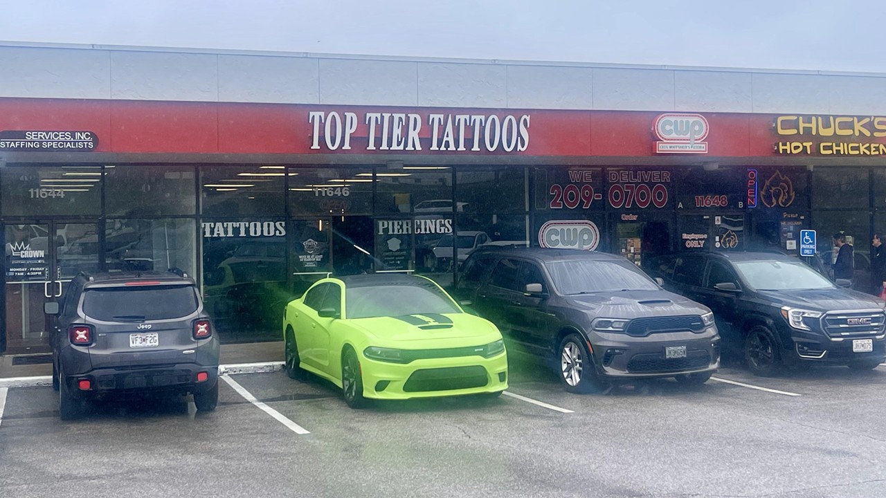 Top Tier Tattoos and Body Piercings is located in a strip mall in Maryland Heights at 11646 Dorsett Road.