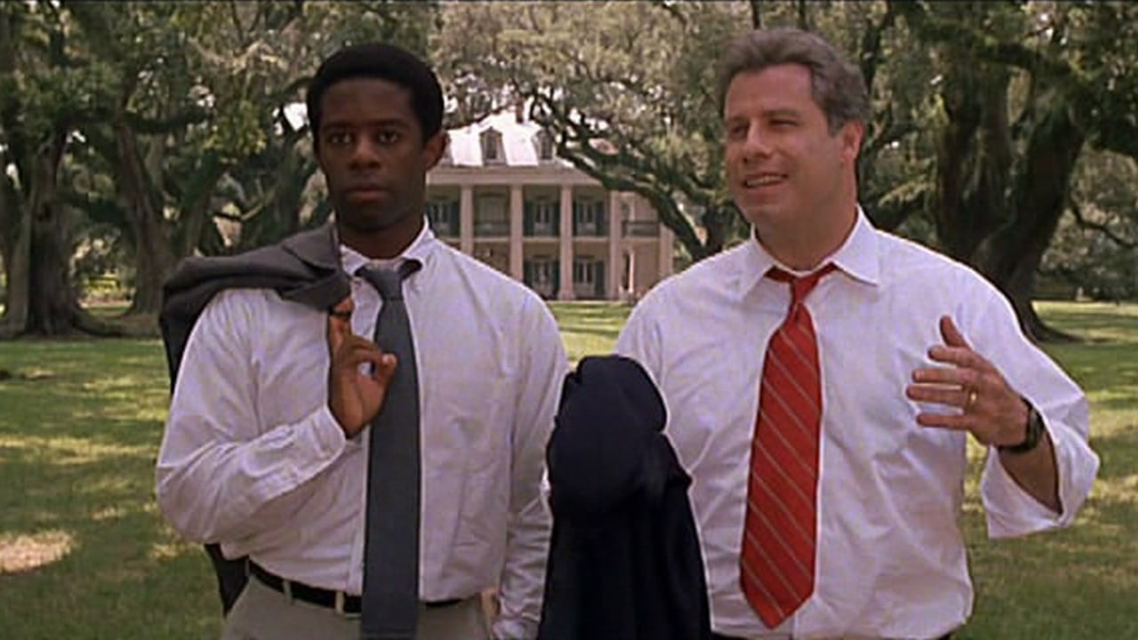 John Travolta (on right) as President Jack Stanton in Primary Colors (1998)
Portraying -- unofficially -- Bill Clinton in this 1998 comedy, John Travolta's a  presidential candidate and eventual commander-in-chief whose personal problems only kind of make us like him more. Kind of like Clinton.