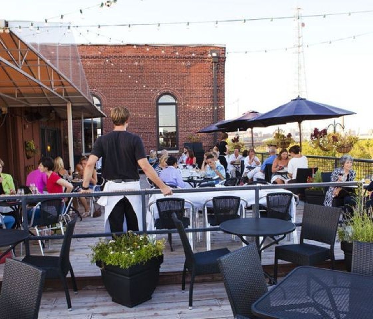 The parking lot at Vin de Set is mobbed by brunch eaters, ready to storm the roof. 
Photo credit: Laura Miller