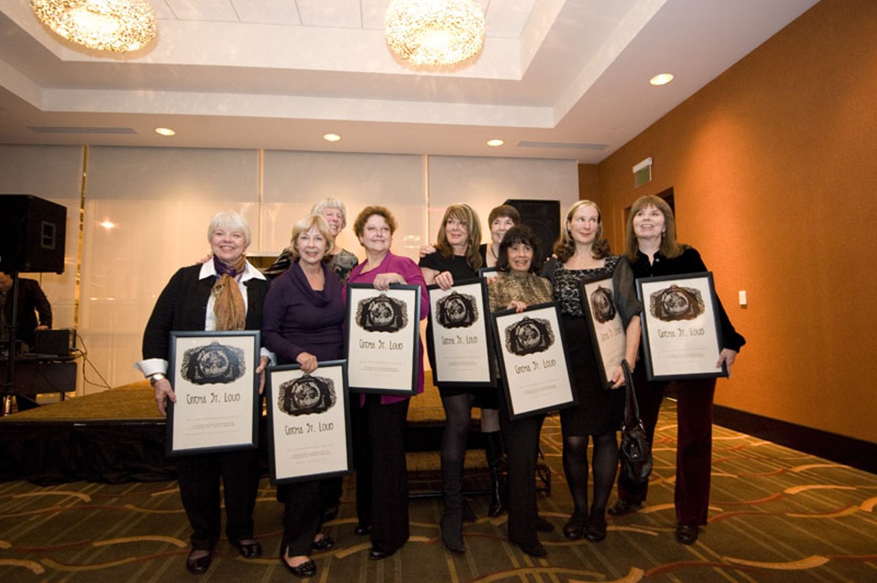 The nine women pose for photos after receiving their Charles Guggenheim Cinema St. Louis Awards for their contributions to the festival over the years.
