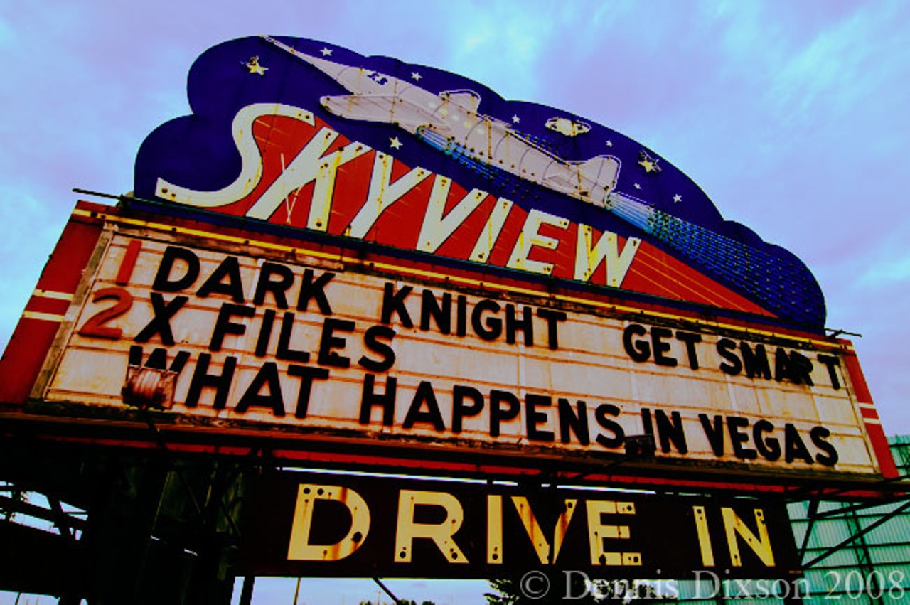Drive up to the drive-in
The Skyview Drive-In
5700 North Belt West, Belleville, Illinois; 618-233-4400
By far the worst part of going to the movies is the exorbitant prices you're expected to pay at the concession stand. The robber barons at the AMCs and Wehrenbergs of the world want you to spend some $30 on chicken feed and sugar water, leaving you with no choice but to line your pockets with more reasonably priced snacks purchased on the way to the theater. It is not fair or right that you are reduced to the status of a common smuggler just for daring to watch a movie on a huge screen. Luckily there's another option, a better way. Belleville's Skyview Drive-In has been entertaining moviegoers in their own cars since 1949 &#151; no smuggling required. Want some popcorn? Go ahead and bring a whole tin. Soda? A cooler full in the backseat will quench your thirst. Go big and get some brown liquor to go with that too; just make one of your more sober companions drive you home. Not that we have any first-hand knowledge about this or anything, but it's reasonable to think you could smoke blunts back to back in your car all throughout the show, as long as you're sly about it. Ditch the pricey concession stands in the typical theaters. It is time to put the dignity back in the moviegoing experience. It is time to visit the Skyview Drive-In. &#151;Daniel Hill
Photo courtesy of Denis Dixson / Flickr