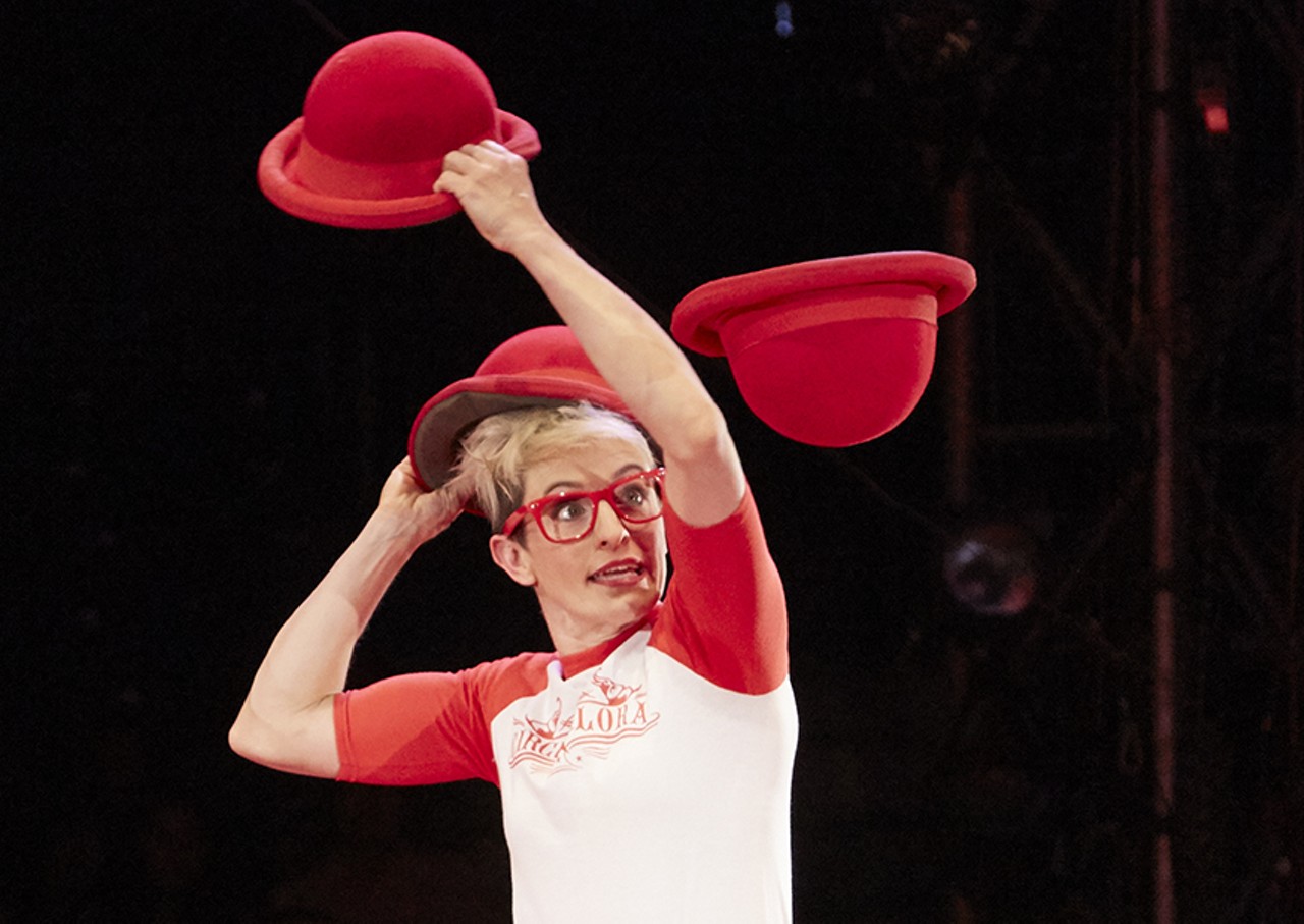 Amanda Crockett, a featured performer this year, displays her skill with juggling hats.