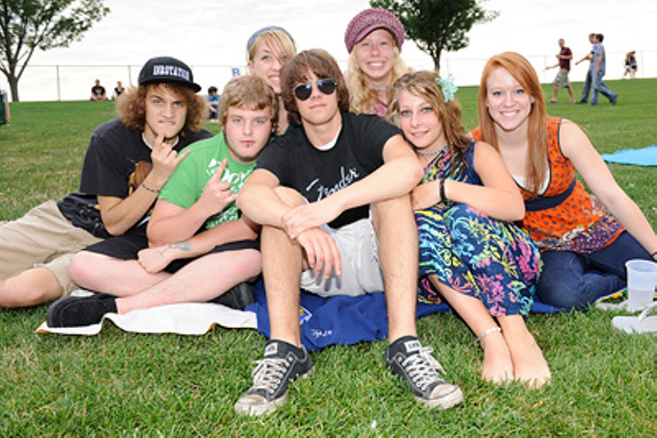 A group of concert-goers attending the Unity Tour featuring 311, Snoop Dogg, and Fiction Plane.