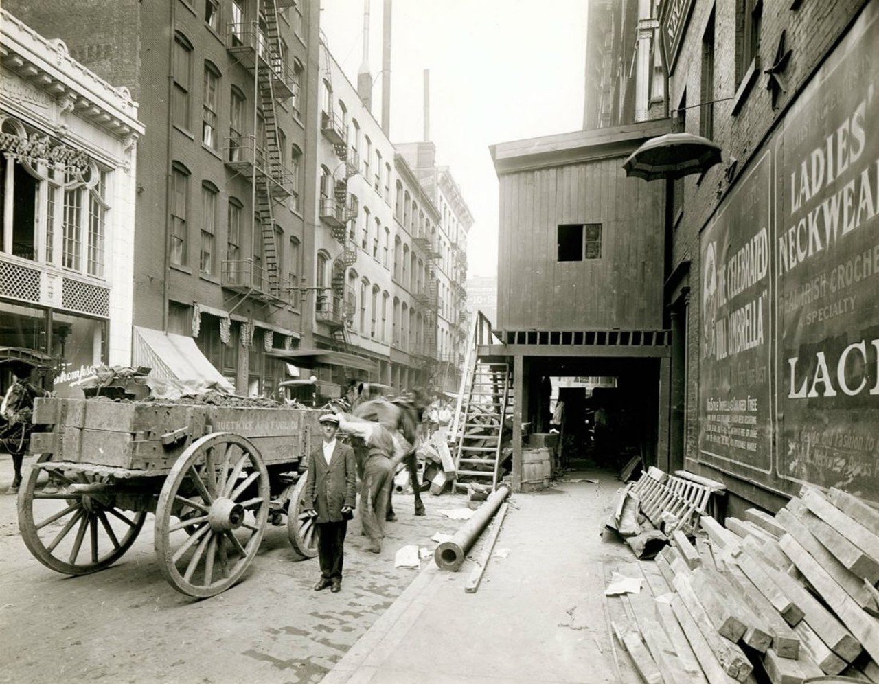 Construction work on St. Charles Street east of Seventh Street. Photograph, ca. 1900.