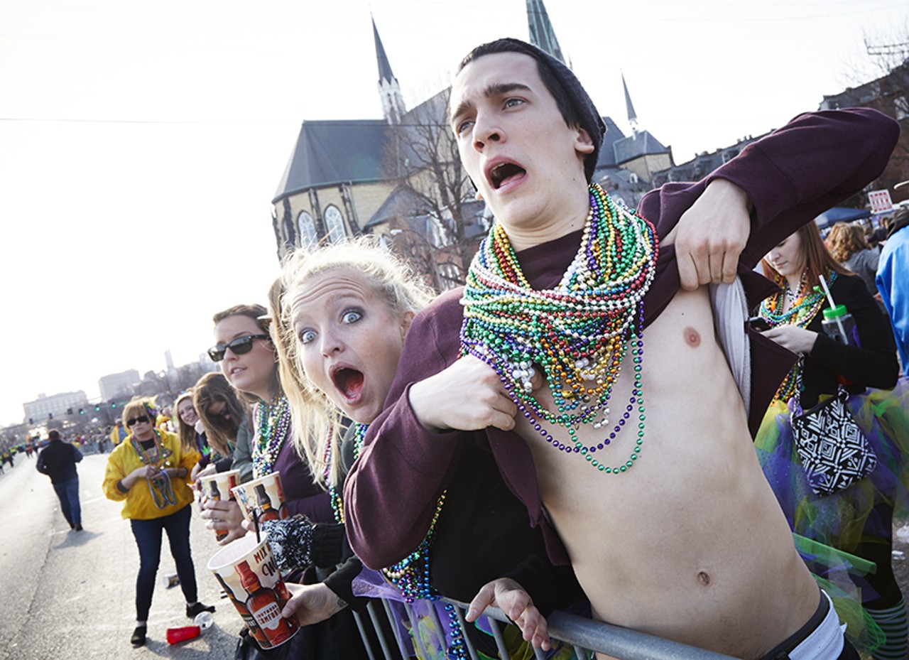 This bro who couldn't express his Mardi Gras passion without lifting up his shirt.