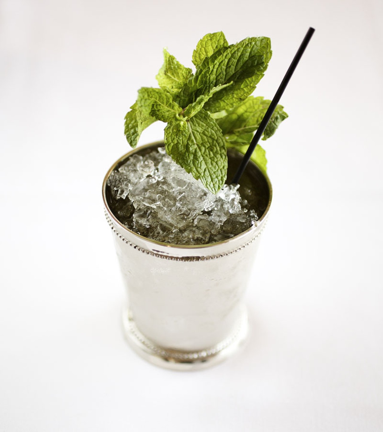 From Addie's drink menu comes the Woodford Mint Julep. It is mixed with Woodford Reserve, gently muddled mint and sugar water and poured over crushed ice. It is served in a traditional steel cup.