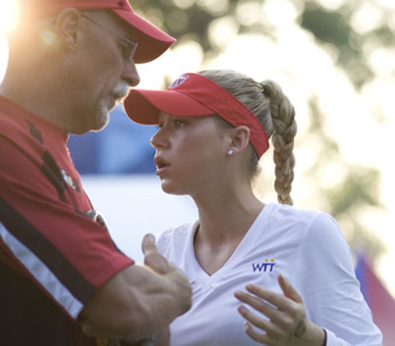 Anna Kournikova talks to coach Greg Patton.