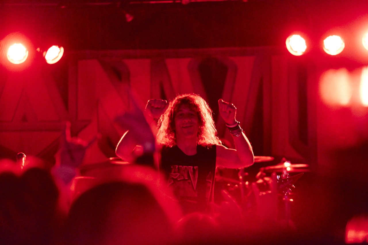 Steve "Lips" Kudlow cheers on fans at the Anvil show on February 19, 2015 at the Fubar.