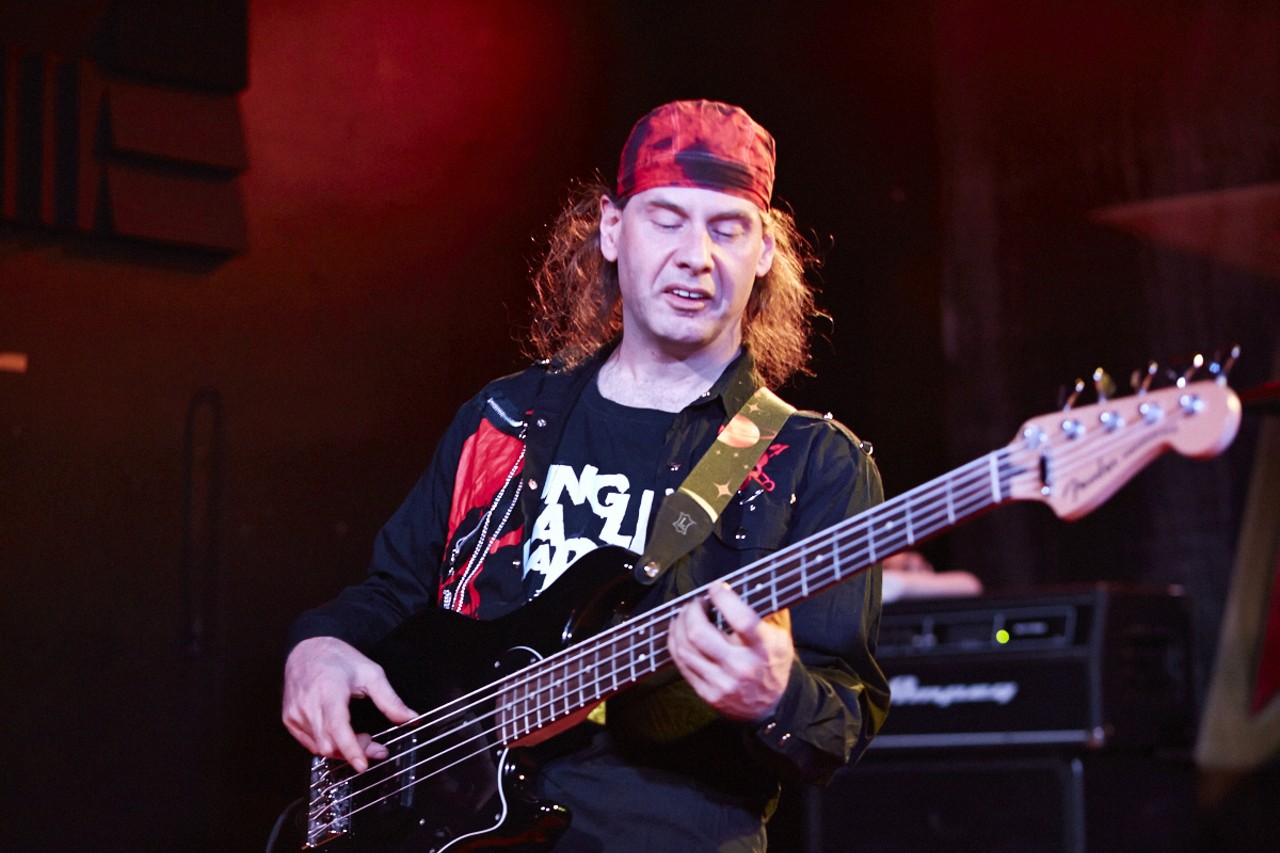 Chris Robertson, Anvil bassist, rocks out at the Anvil show on February 19, 2015 at Fubar.