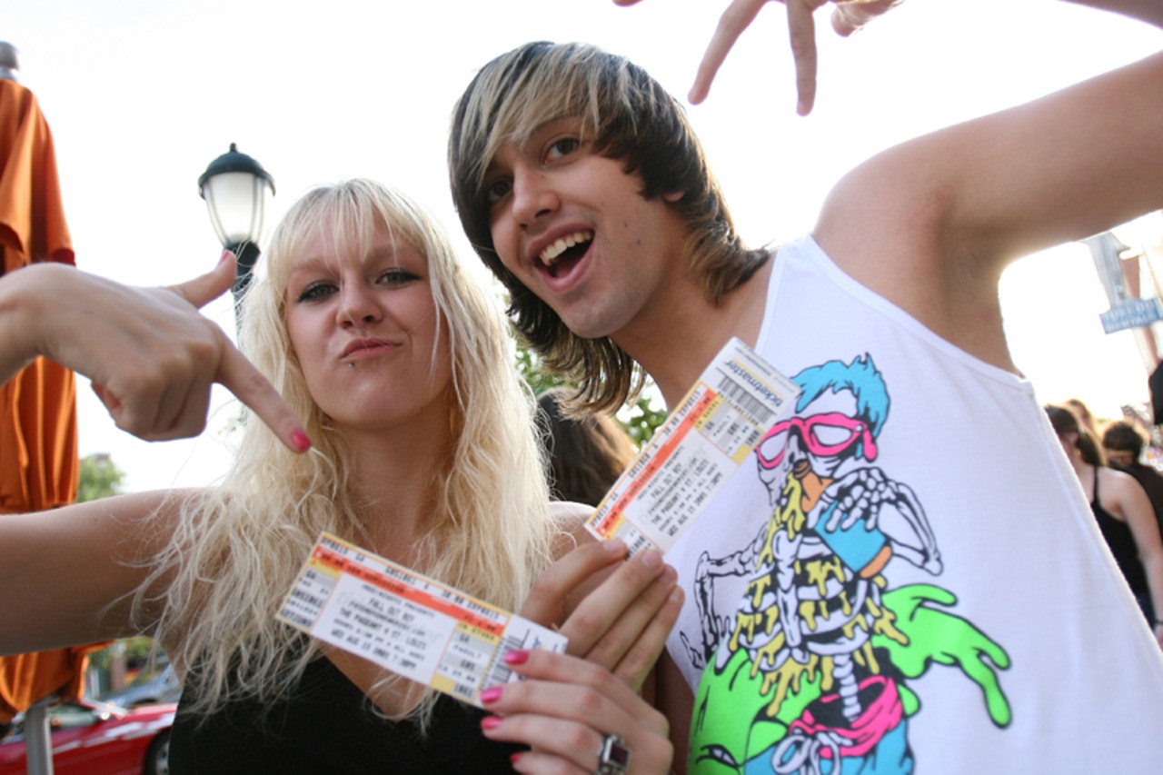 We got Fall Out Boy tickets, ya'll! Two concert-goers waiting in line on August 19 to get inside the Pageant, where Fall Out Boy headlined (and Pete Wentz took his shirt off.) See photos.
