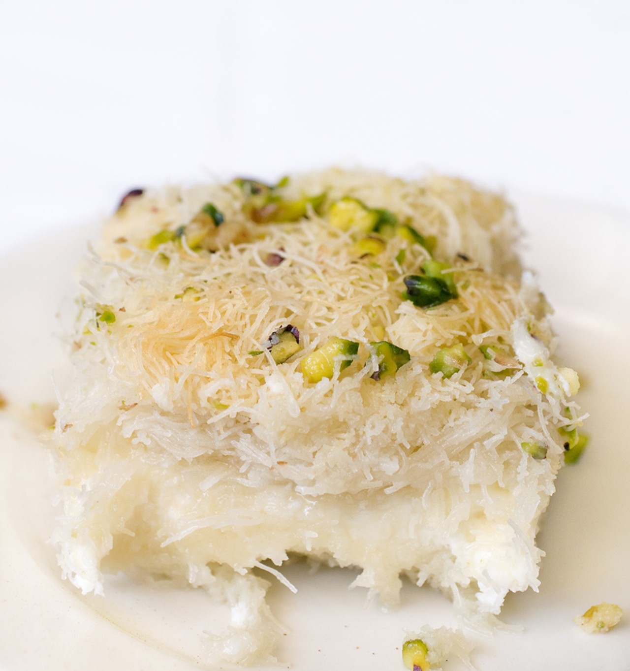 Time for dessert: Knafeh, Ranoush&rsquo;s signature dessert. A hybrid of baklava and cheesecake &ndash; sweet soft cheese sandwiched between layer&rsquo;s of bird&rsquo;s nest phyllo topped with pistachio nuts.