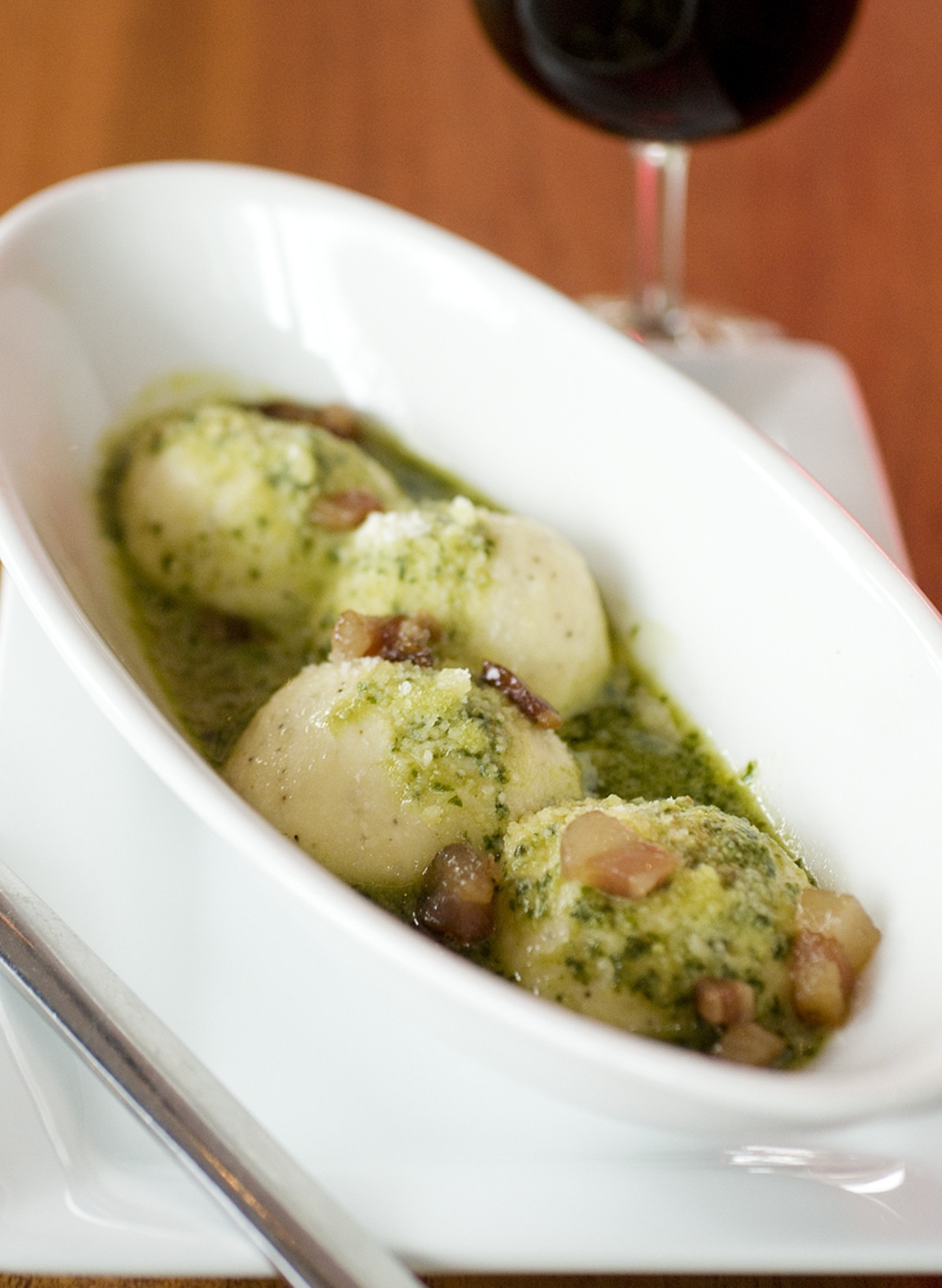 Acero&rsquo;s Gnudi with basil pesto and guanciale. Guanciale -- a central Italian delicacy -- is unsmoked bacon with a stronger flavor, yet more delicate texture, than pancetta.