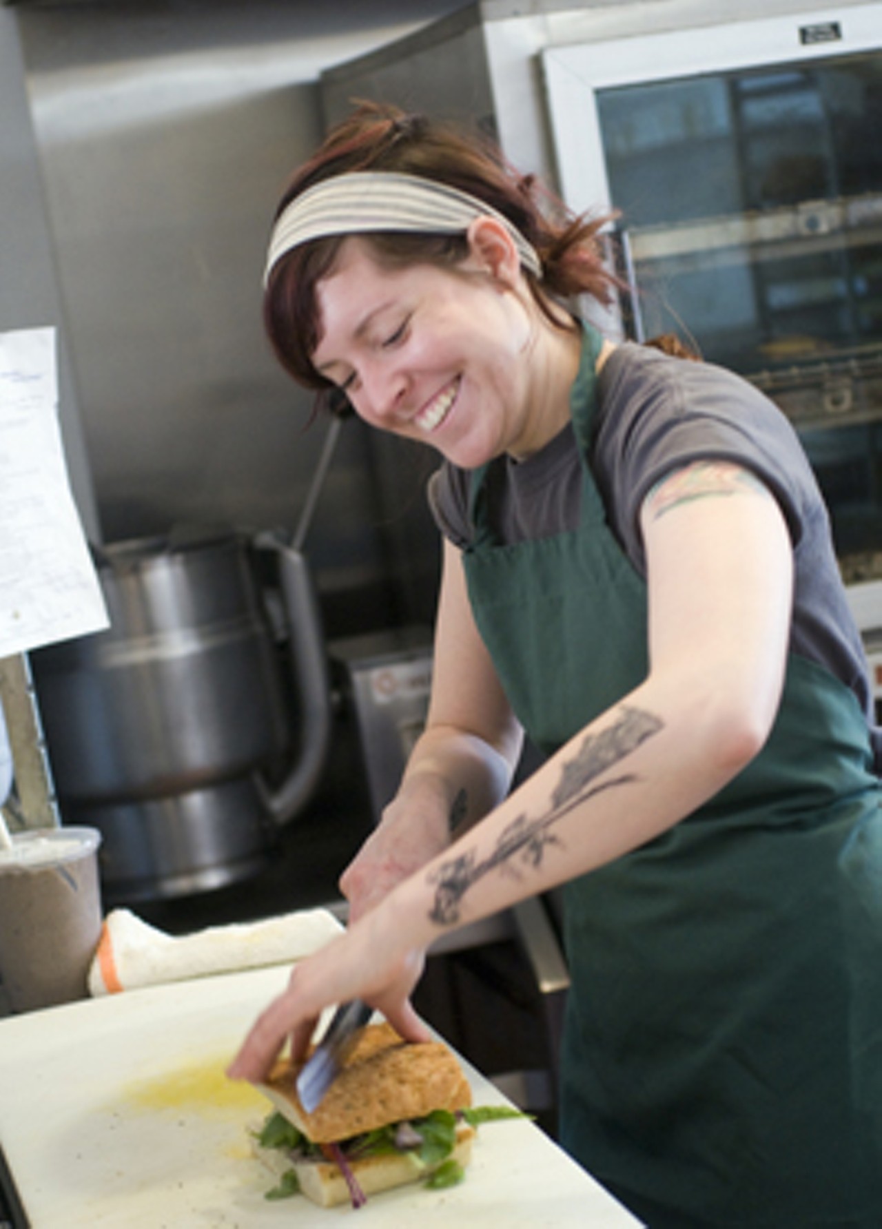 Molly Brady at work in the kitchen. Read Ian Froeb's review: "Plant Power: Local Harvest Caf&ecirc; embodies a welcome new concept in sustainable chowing-down."