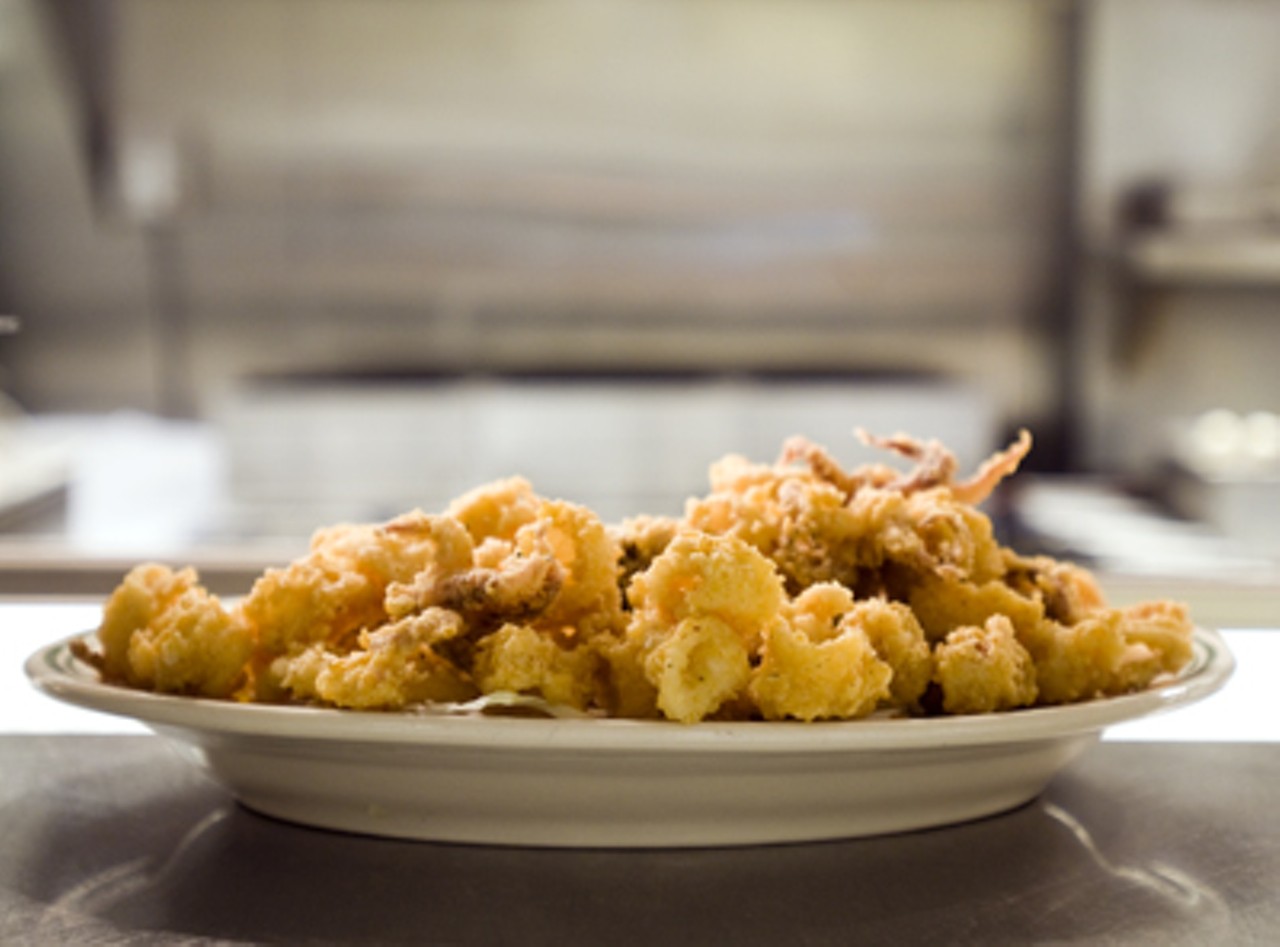 Flash-fried calamari is served with a trio of dipping sauces.