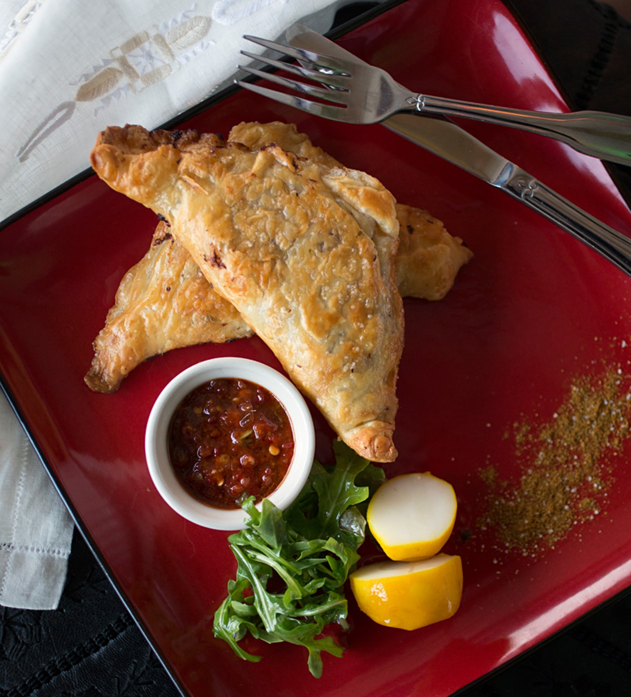 M'lwee might be Baida's signature dish: It's a flaky layered pastry stuffed with kefta (beef), garlic, cumin, coriander, herbs and other spices, then pan-fried. M'lwee is served with harissa on the side.