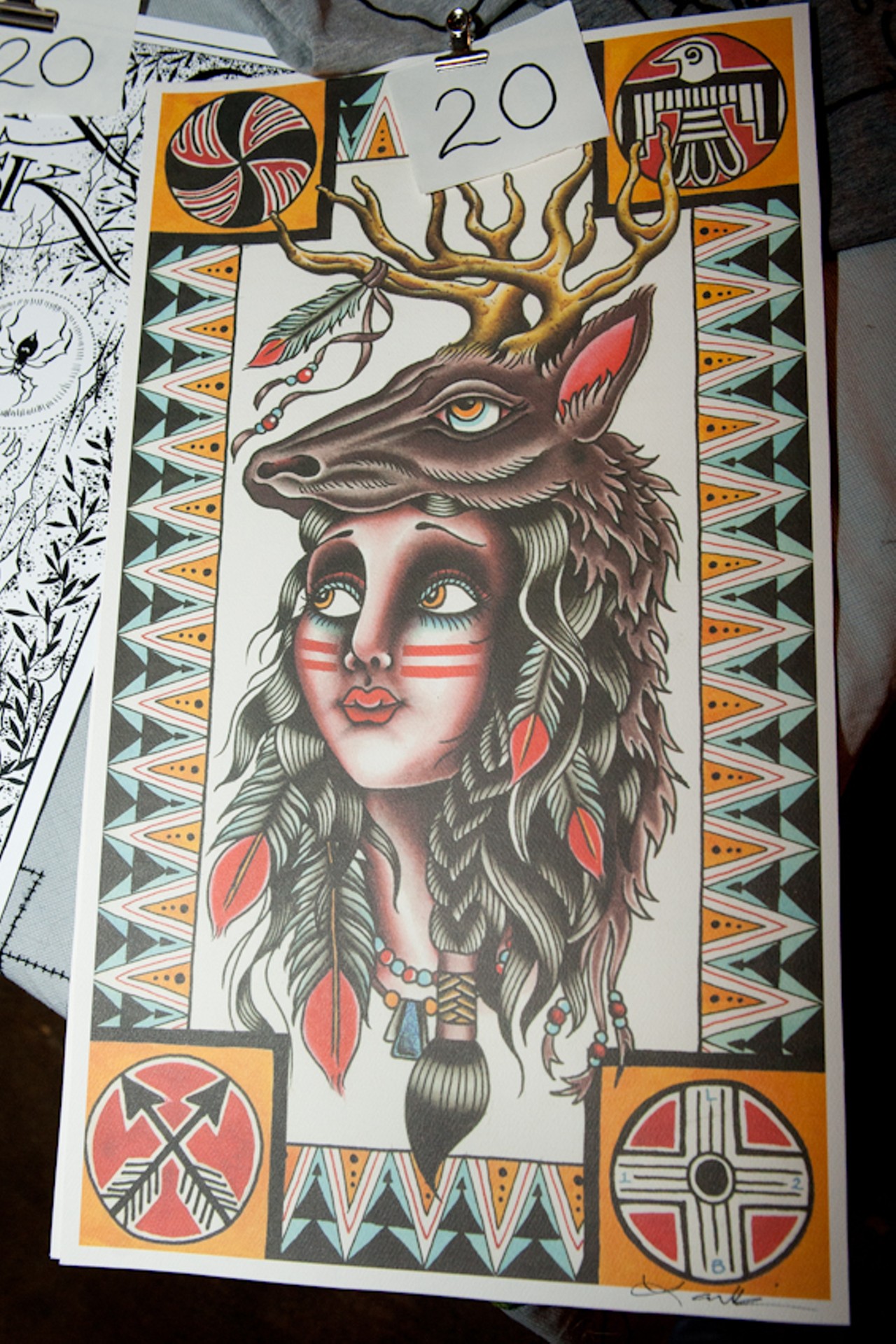 Prints available for sale at the Tower Classic Tattooing table.